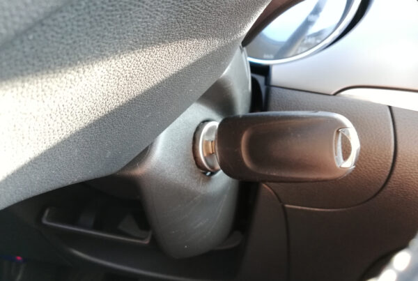 Plain car key inside keyhole locksmith service
